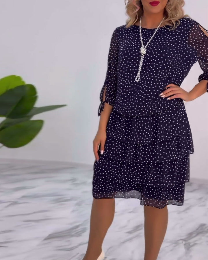 Elegant layered dress with polka dot print