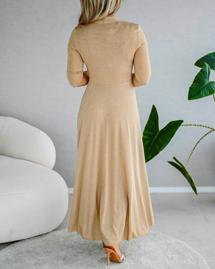 Elegant solid-colored dress with V-neck three-quarter sleeves