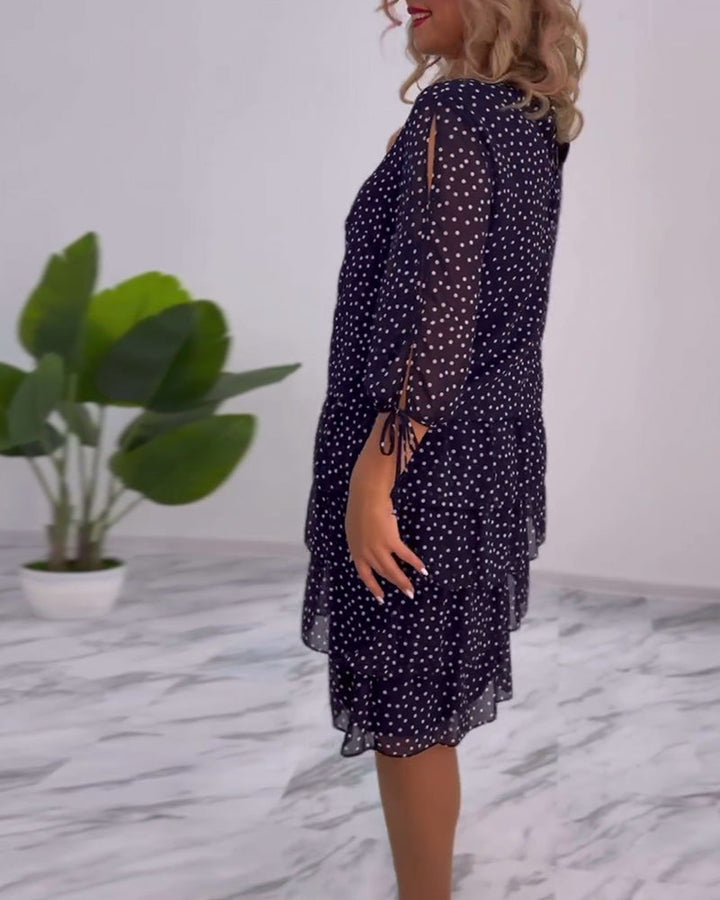 Elegant layered dress with polka dot print