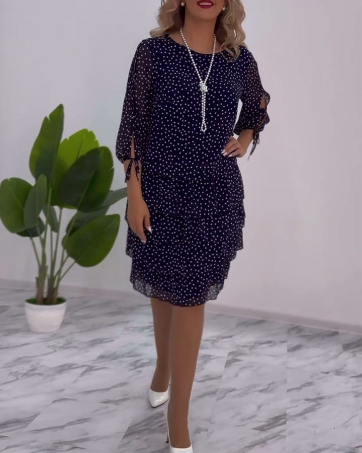 Elegant layered dress with polka dot print